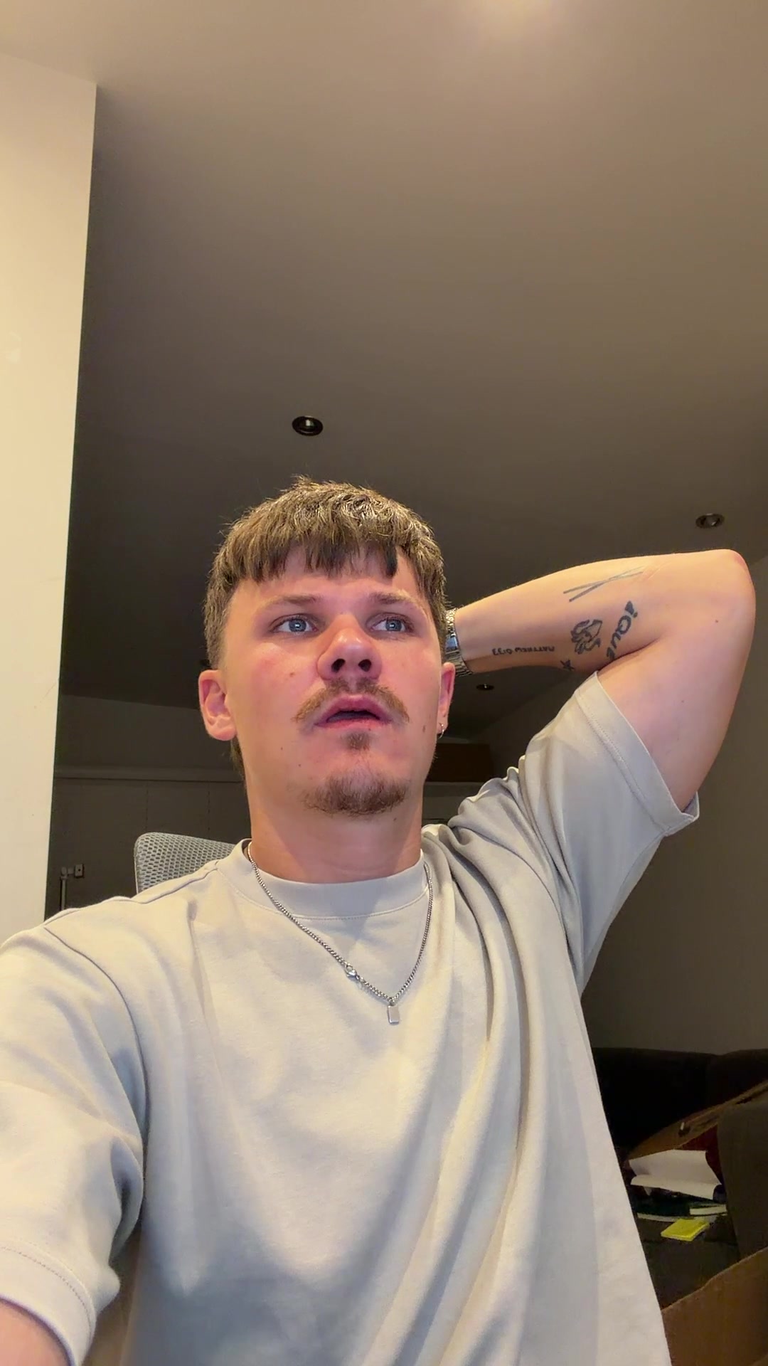 Man Reacts with Wide-Eyed Surprise