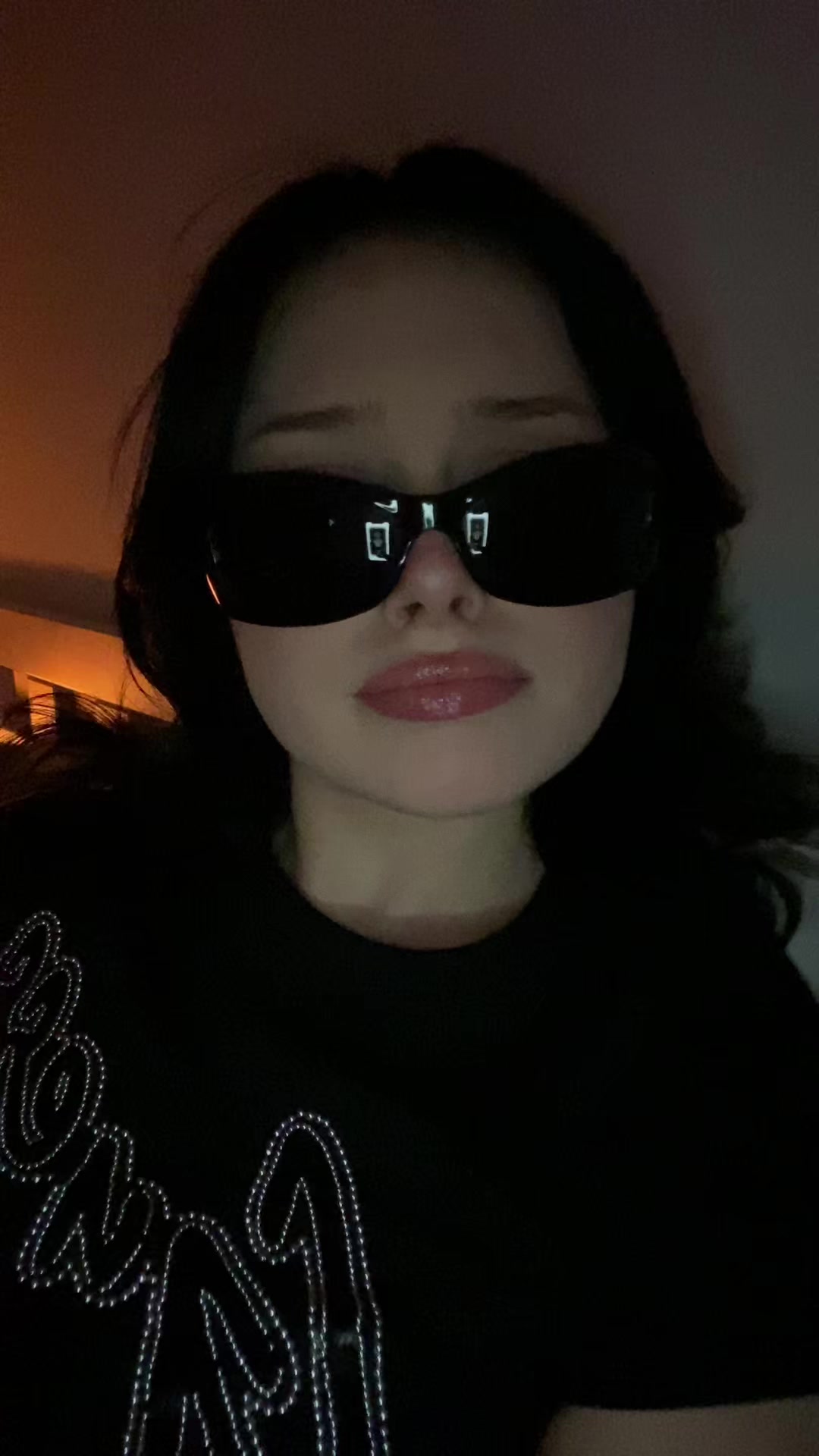 Playful Person in Sunglasses with Gestures