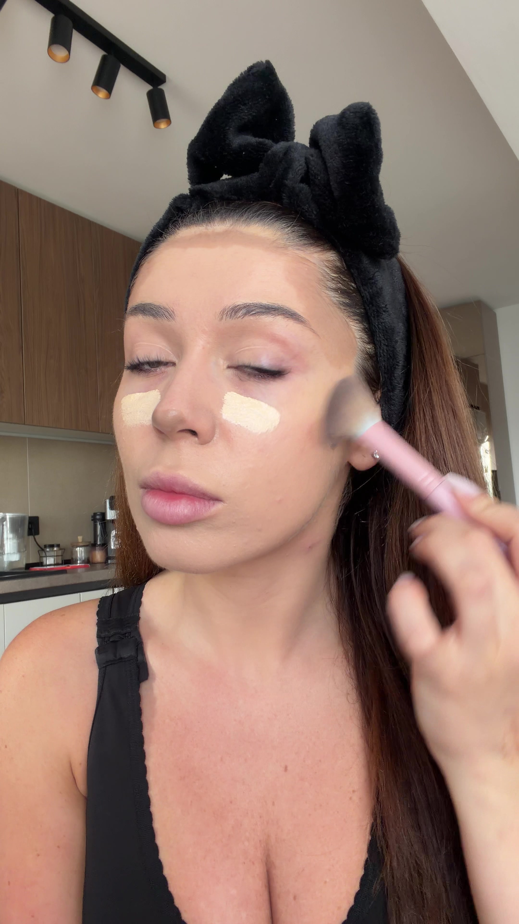 Woman's shocked reaction during makeup