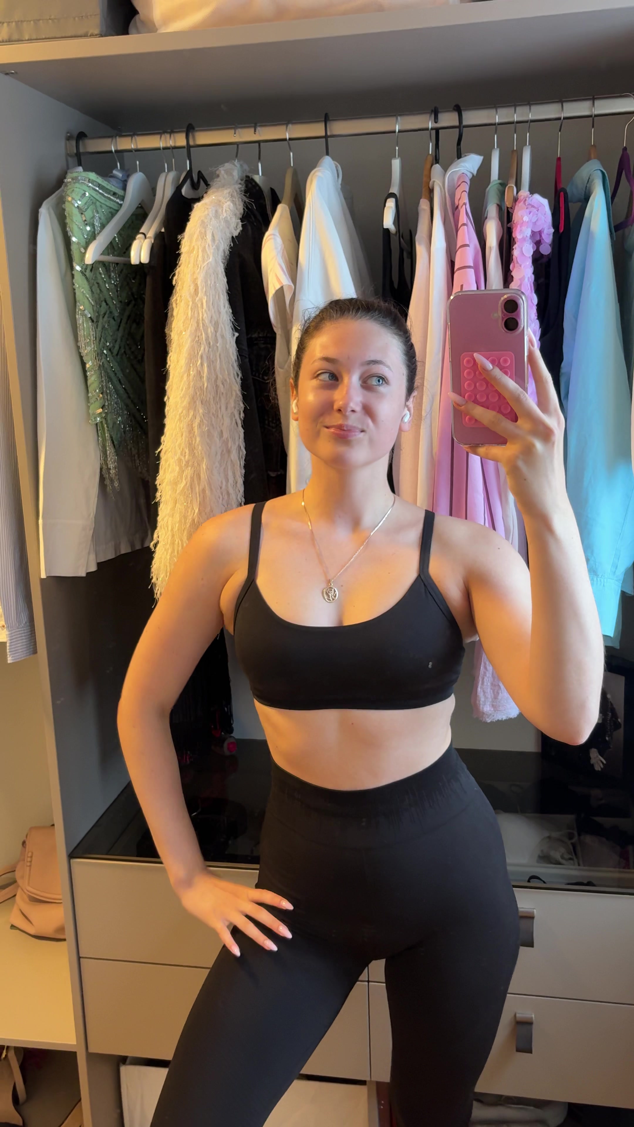 Confident Woman Posing in Closet