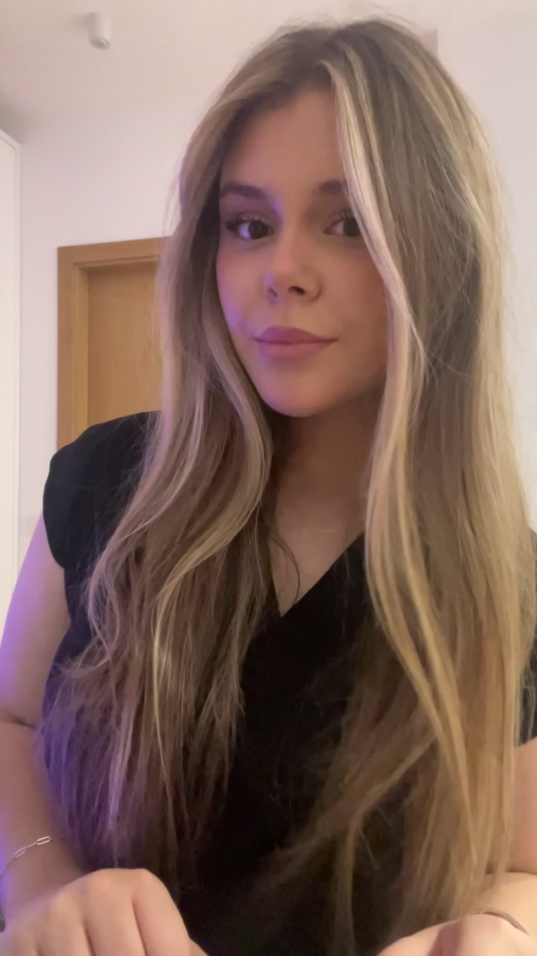 Smiling Woman Reacts, Covers Mouth