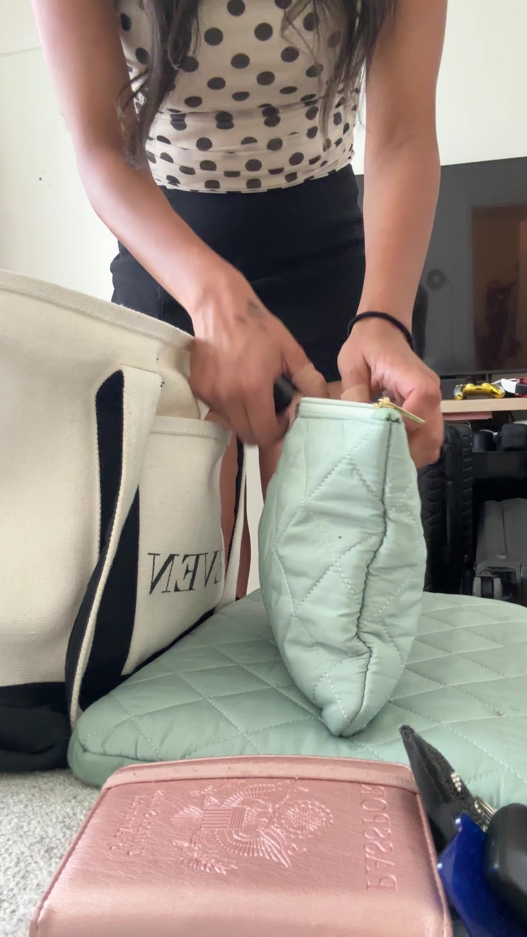 Woman packing bag for a trip