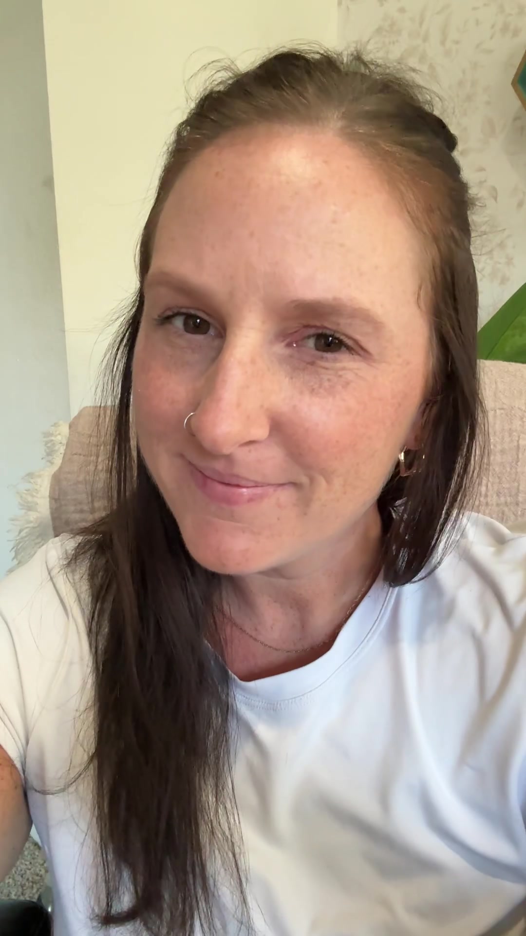 Woman Smiles and Speaks Happily