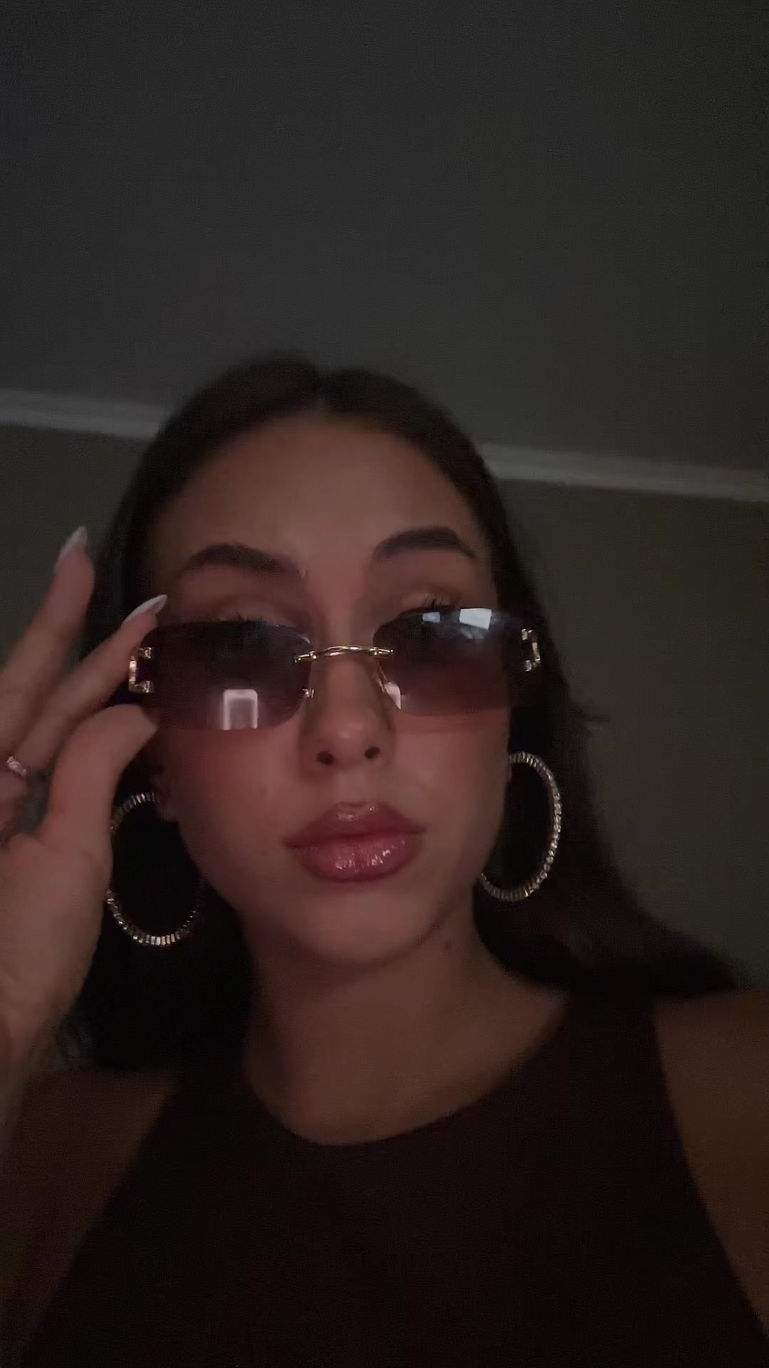 Confident Girl Posing in Sunglasses
