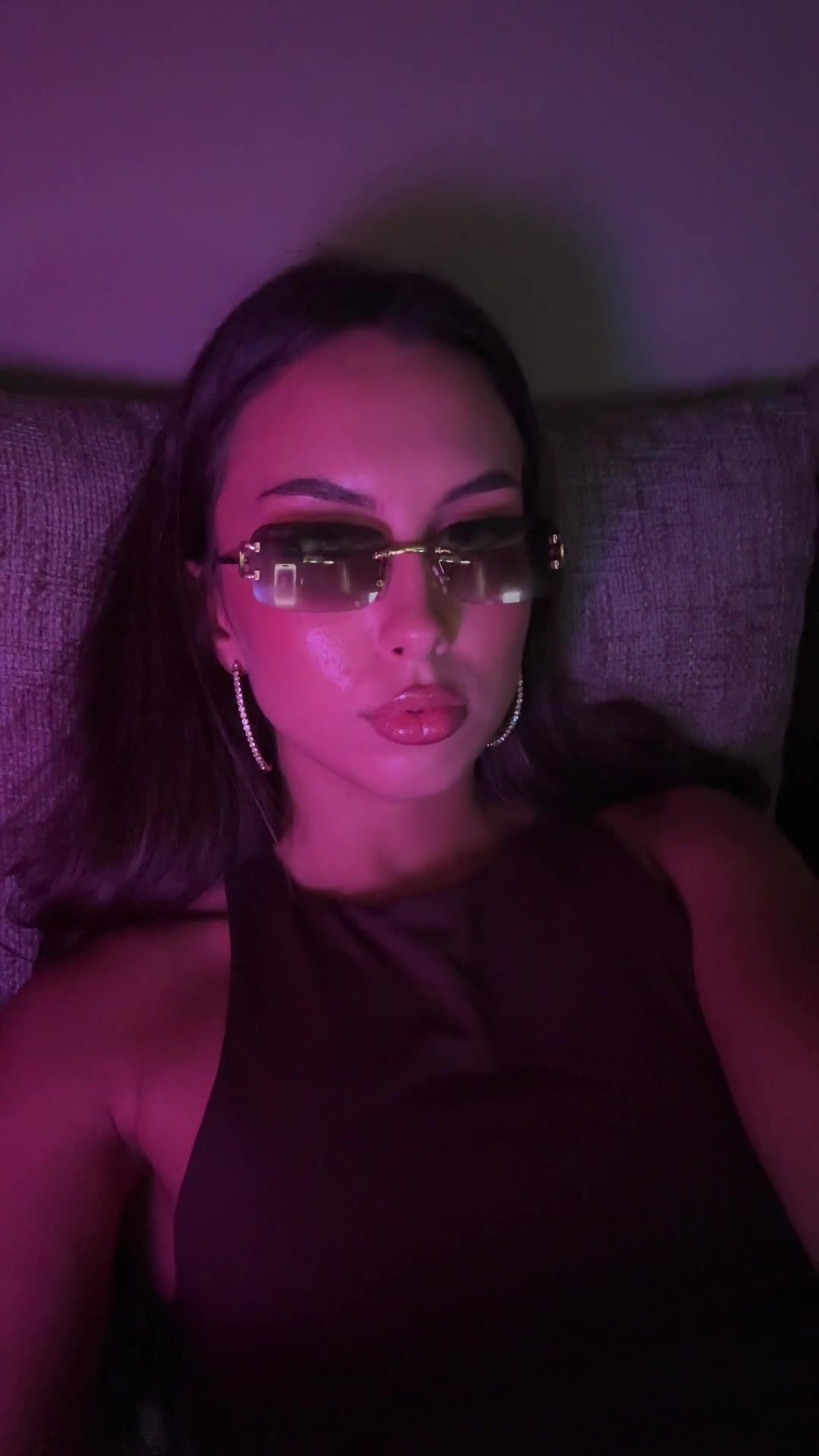 Confident Woman Posing with Sunglasses