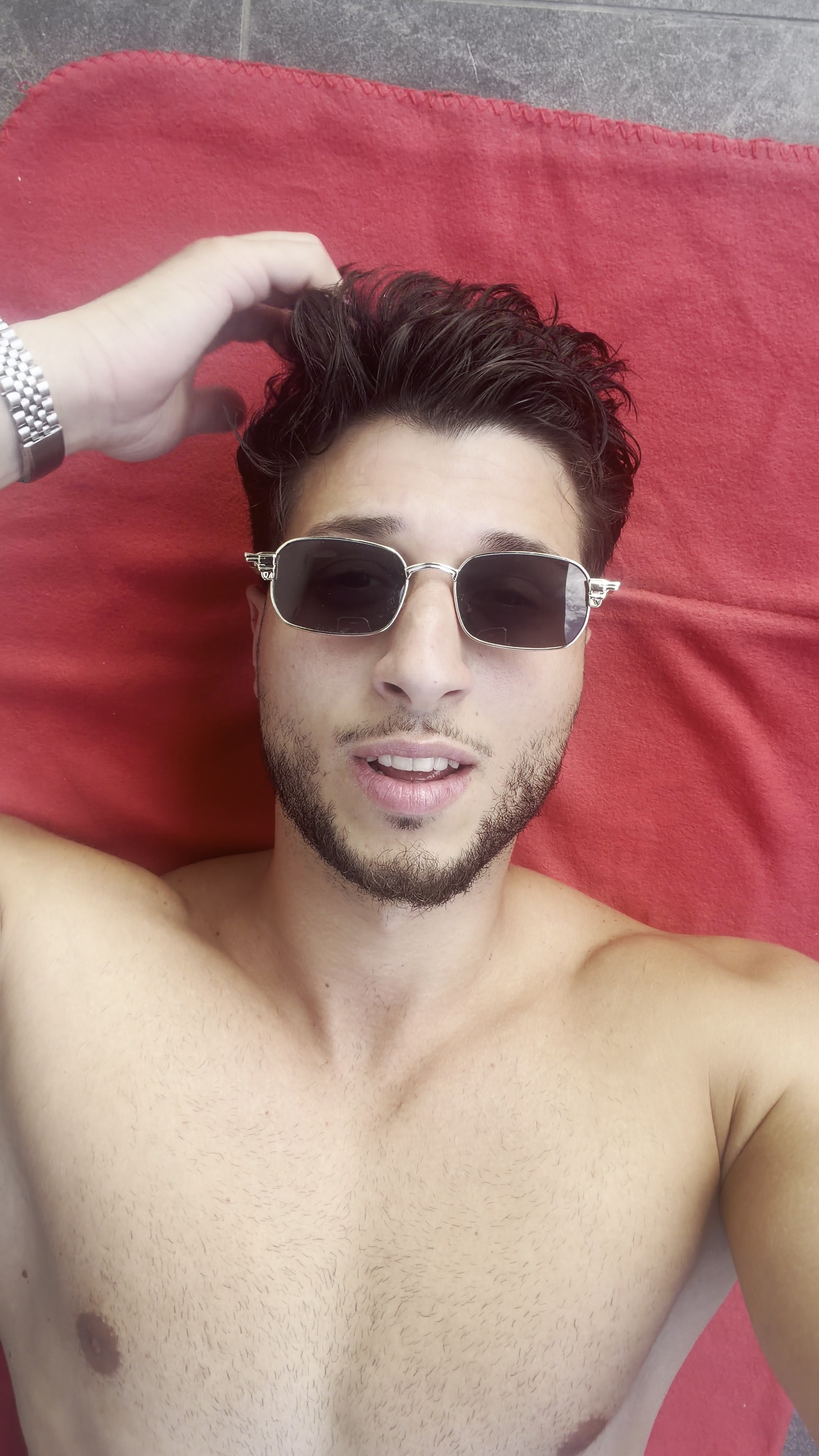 Relaxed Man Posing in Sunglasses