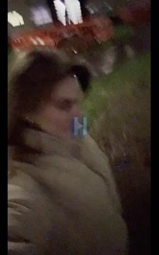 Woman Reacts to Something Off-Screen